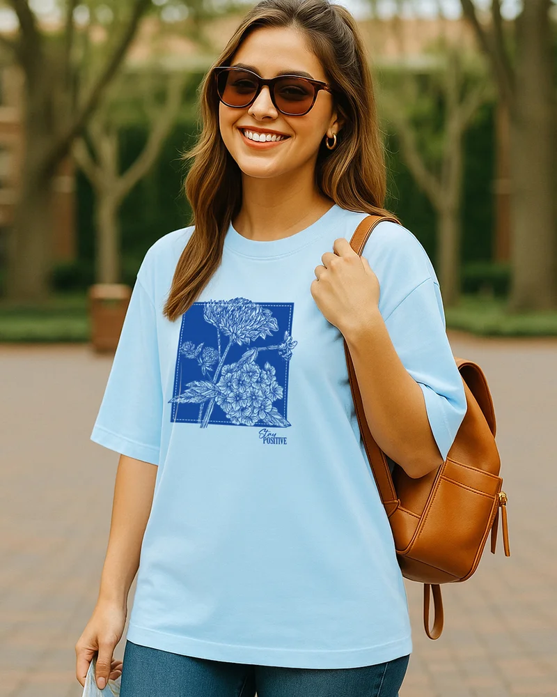 bewakoof Women's Sky Blue Stay Positive Graphic Printed Oversized T-shirt